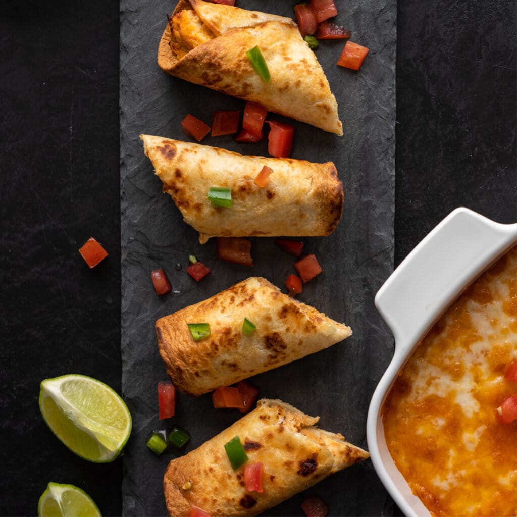 Crispy Chicken Taquitos with Queso